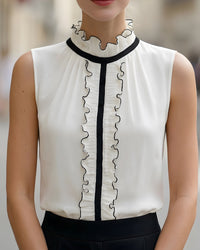 Sleeveless Ruffled Blouse With Black Contrast Trim